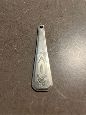 Handmade Silver or silvertone pendant 4”. Can be used as keychain as well